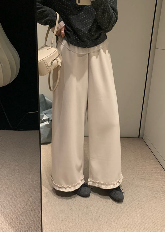 // 木耳邊花邊腳毛呢褲