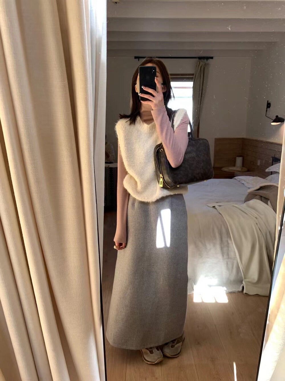 // 毛毛茸疊穿針織背心