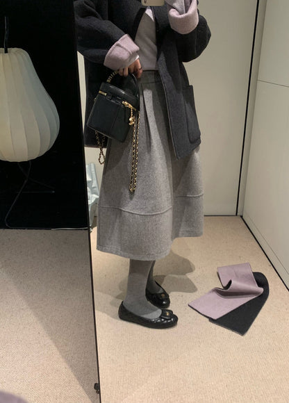 // 巨遮肉廓型毛呢中裙