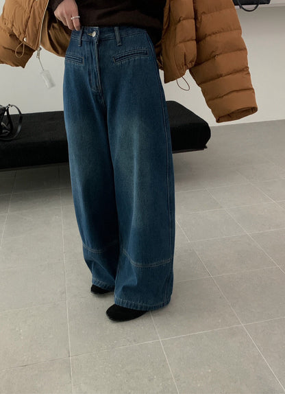 // 雙口袋裝飾拼接褲腳加絨全長牛仔褲