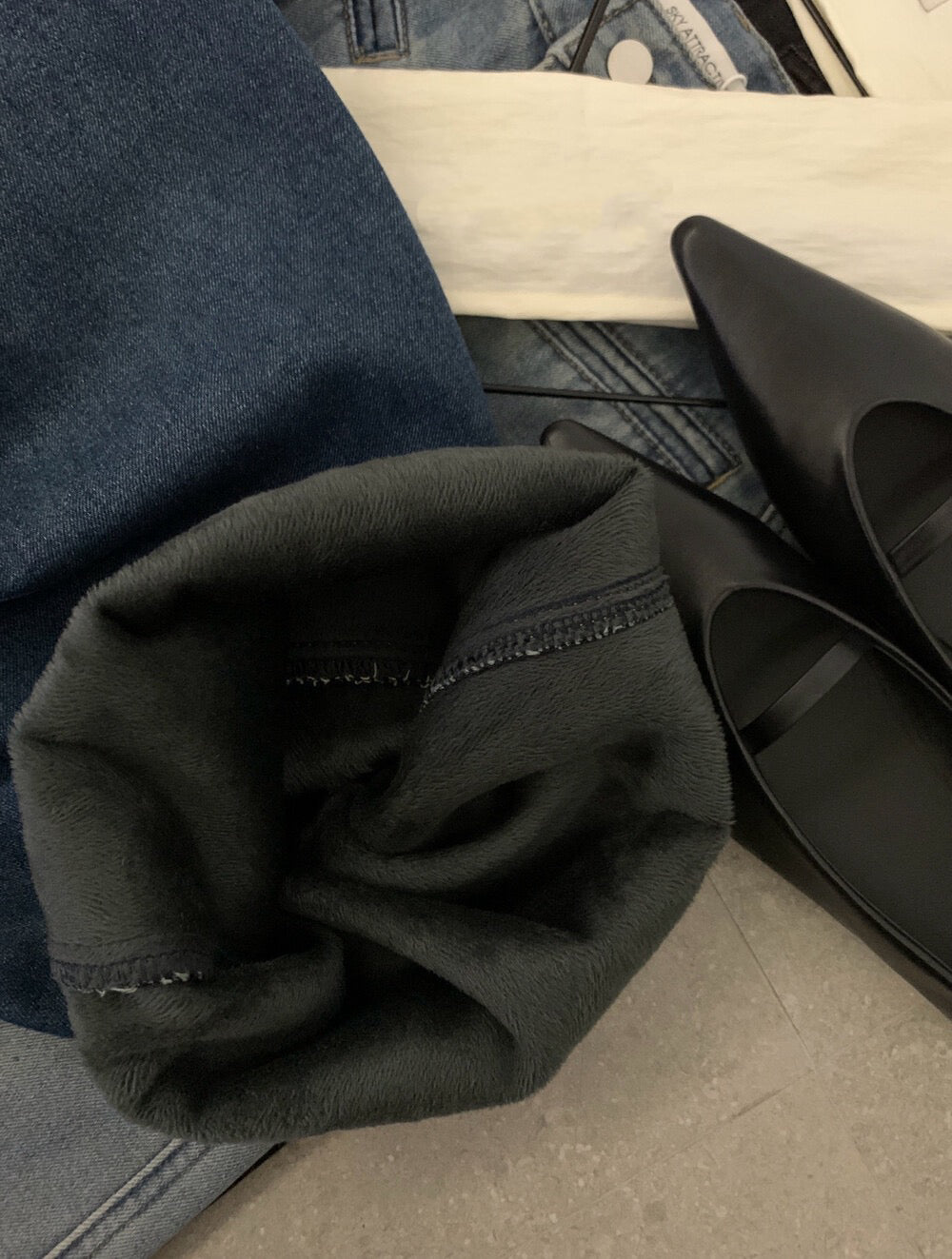 // 雙口袋裝飾拼接褲腳加絨全長牛仔褲