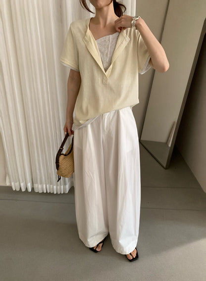 // 設計感假兩件鈕扣TEE