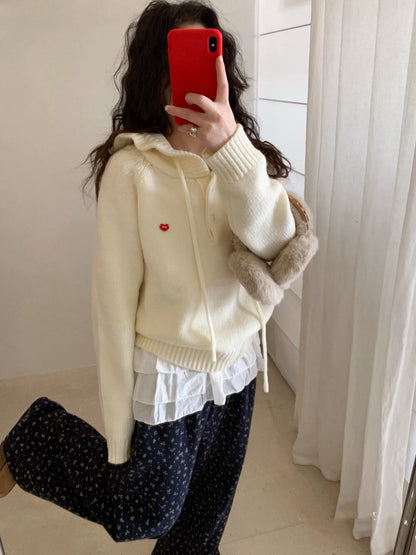 // 精緻花邊帽心心金屬貼牌毛衣