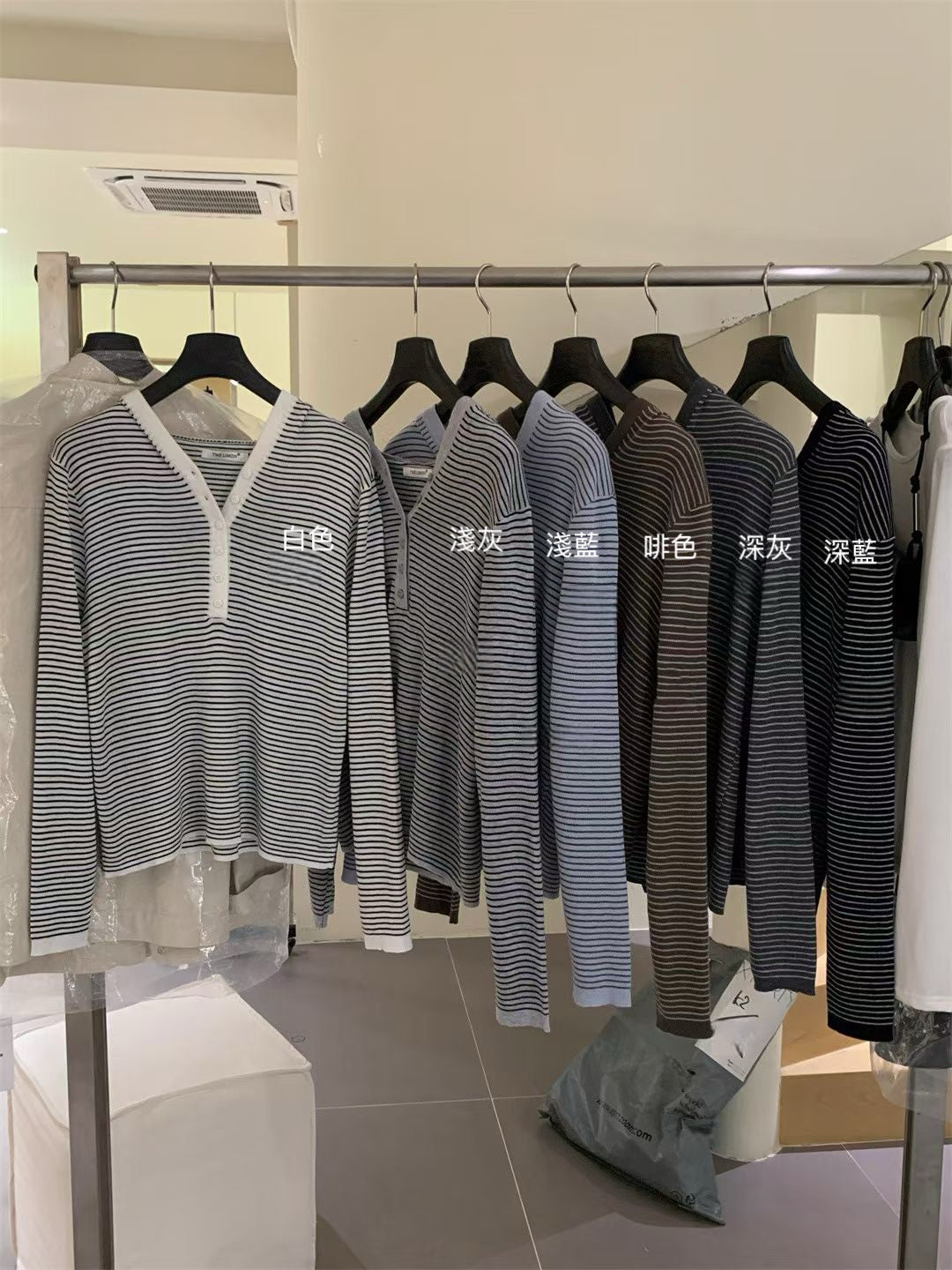 // 慵懶感連帽細間條NT