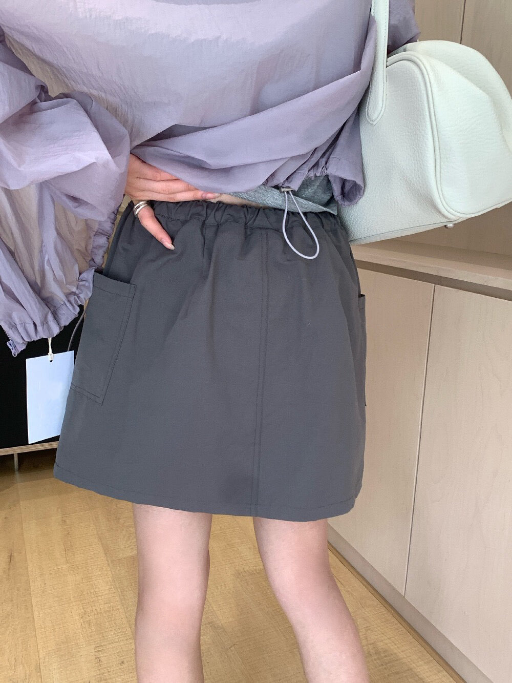 // 抽繩裙頭口袋工裝短裙