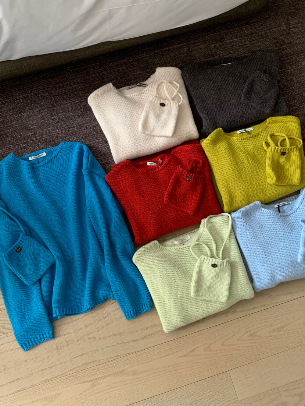 // 20%羊毛疏針圓領NT(連小袋仔)