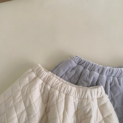 // 減齡款絲絨菱格蓬蓬短裙