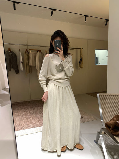 // 設計感交叉露肩針織上衣