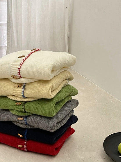 // 設計感撞色縫線包邊牛角鈕連帽CD