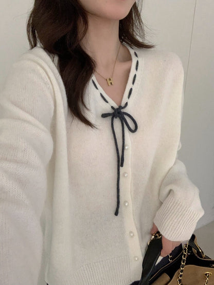 // 100%羊毛縫線蝴蝶結領口開胸NT