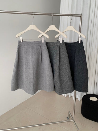 // 巨遮肉廓型毛呢中裙