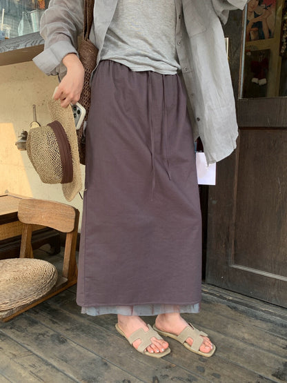 // 麻質拼接腳綁帶腰中裙