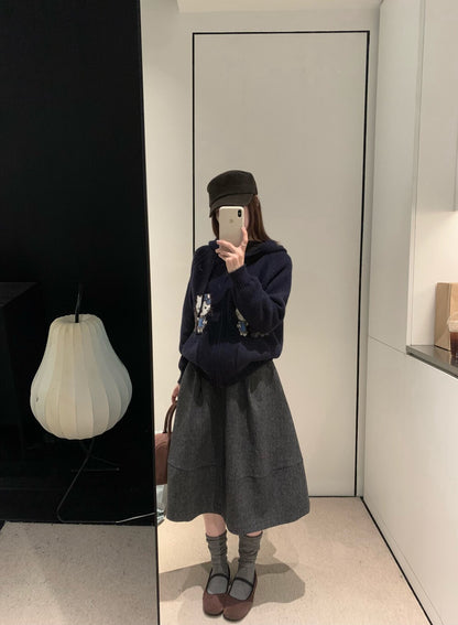 // 巨遮肉廓型毛呢中裙