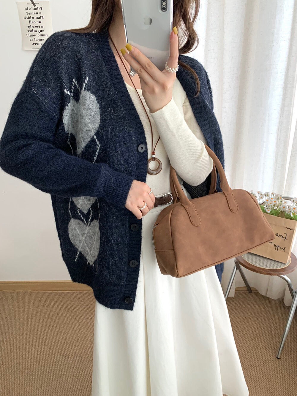 // 6%羊毛復古心心菱格V領CD