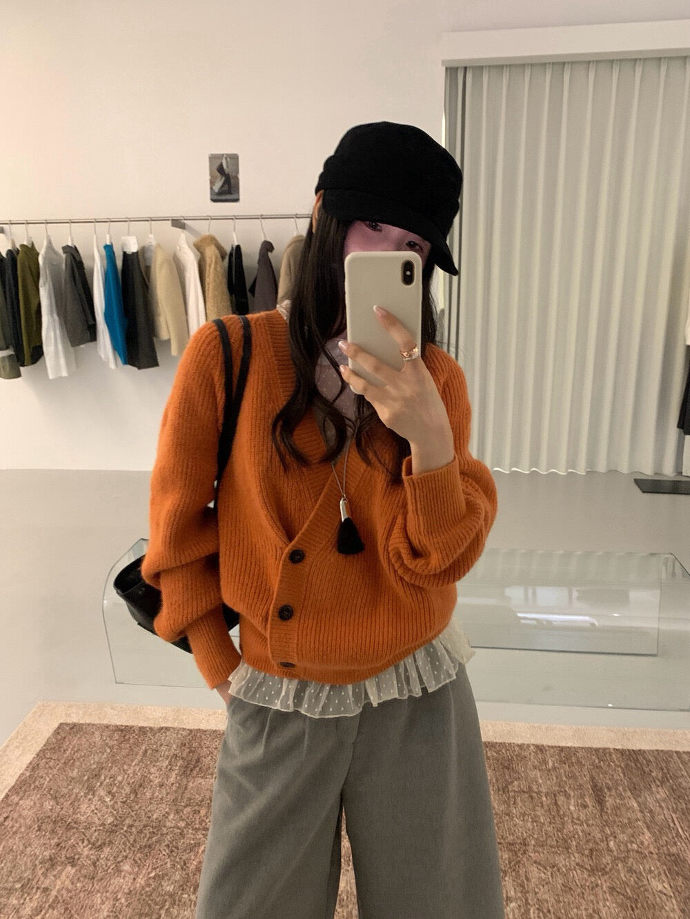 // 設計感交叉側鈕扣深V毛衣