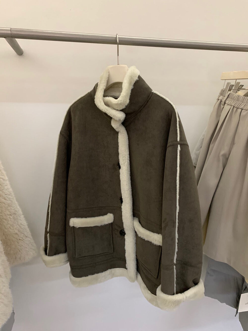 // 立領皮毛一體口袋中長外套