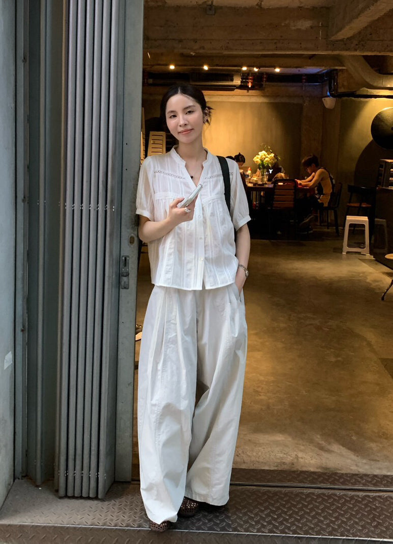 // 暗紋拼接鈎花小V領BL