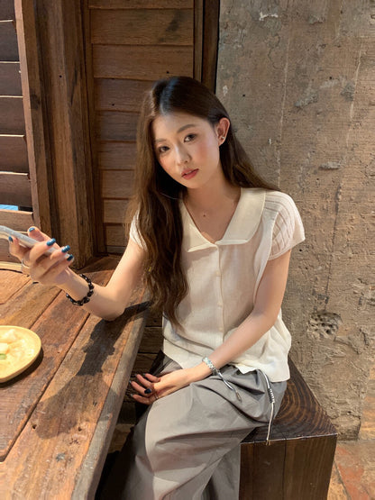// 特別織紋袖娃娃領排扣短袖NT