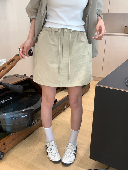 // 抽繩裙頭口袋工裝短裙