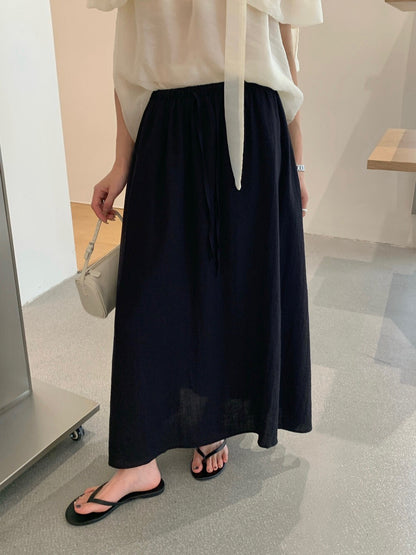 // 極簡鬆弛感麻質中裙