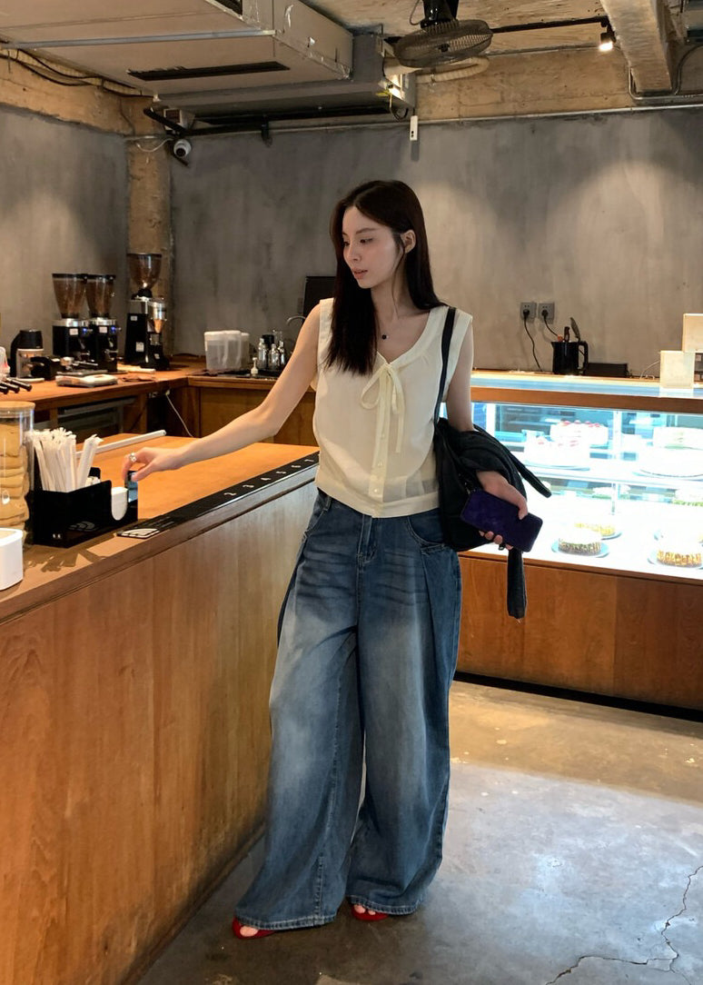 // 設計感壓褶復古感洗水牛仔闊褲