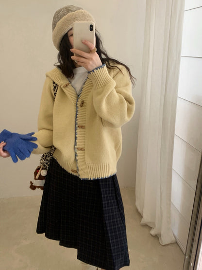 // 設計感撞色縫線包邊牛角鈕連帽CD