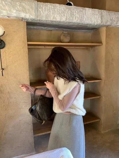 // 毛毛茸疊穿針織背心