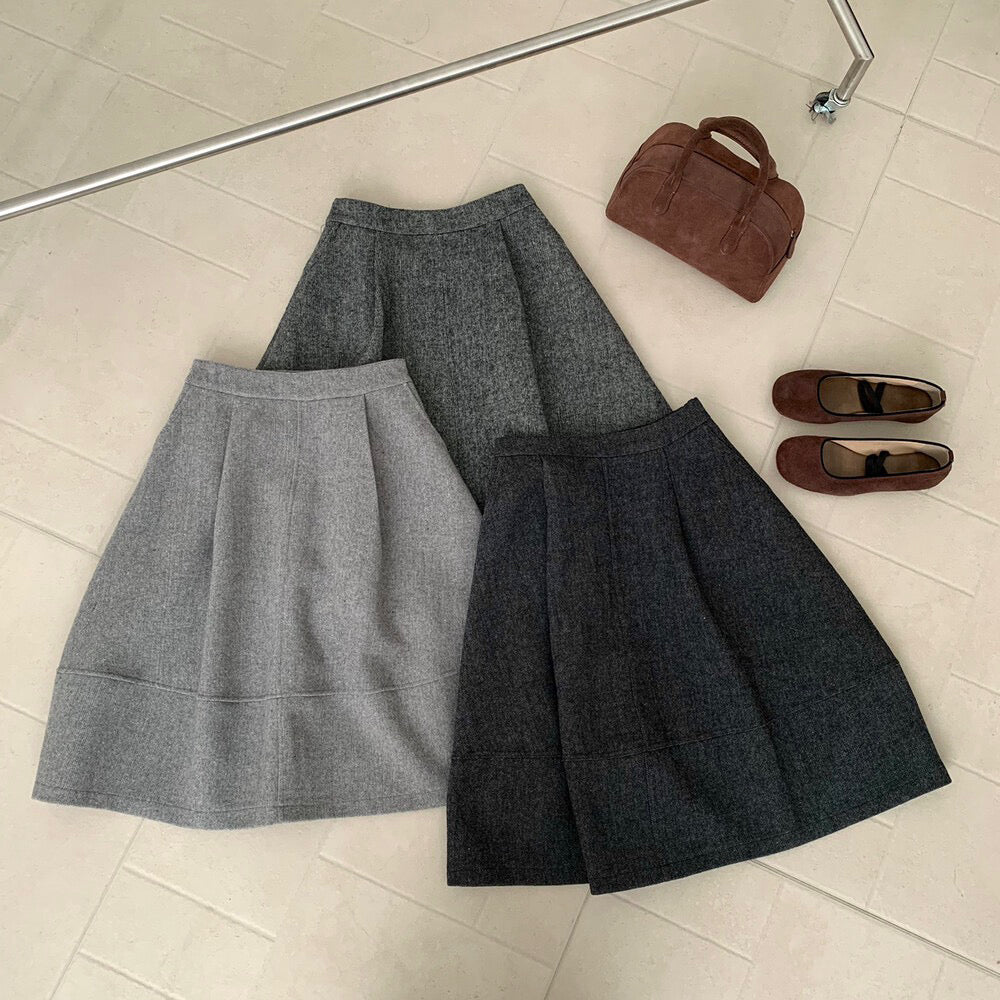 // 巨遮肉廓型毛呢中裙