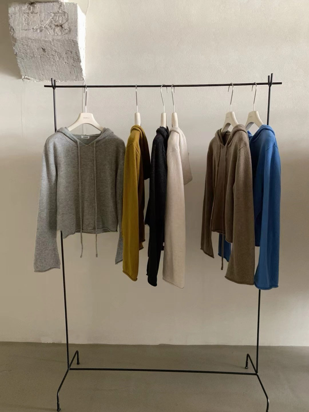 // 100%羊毛連帽卷邊毛衣