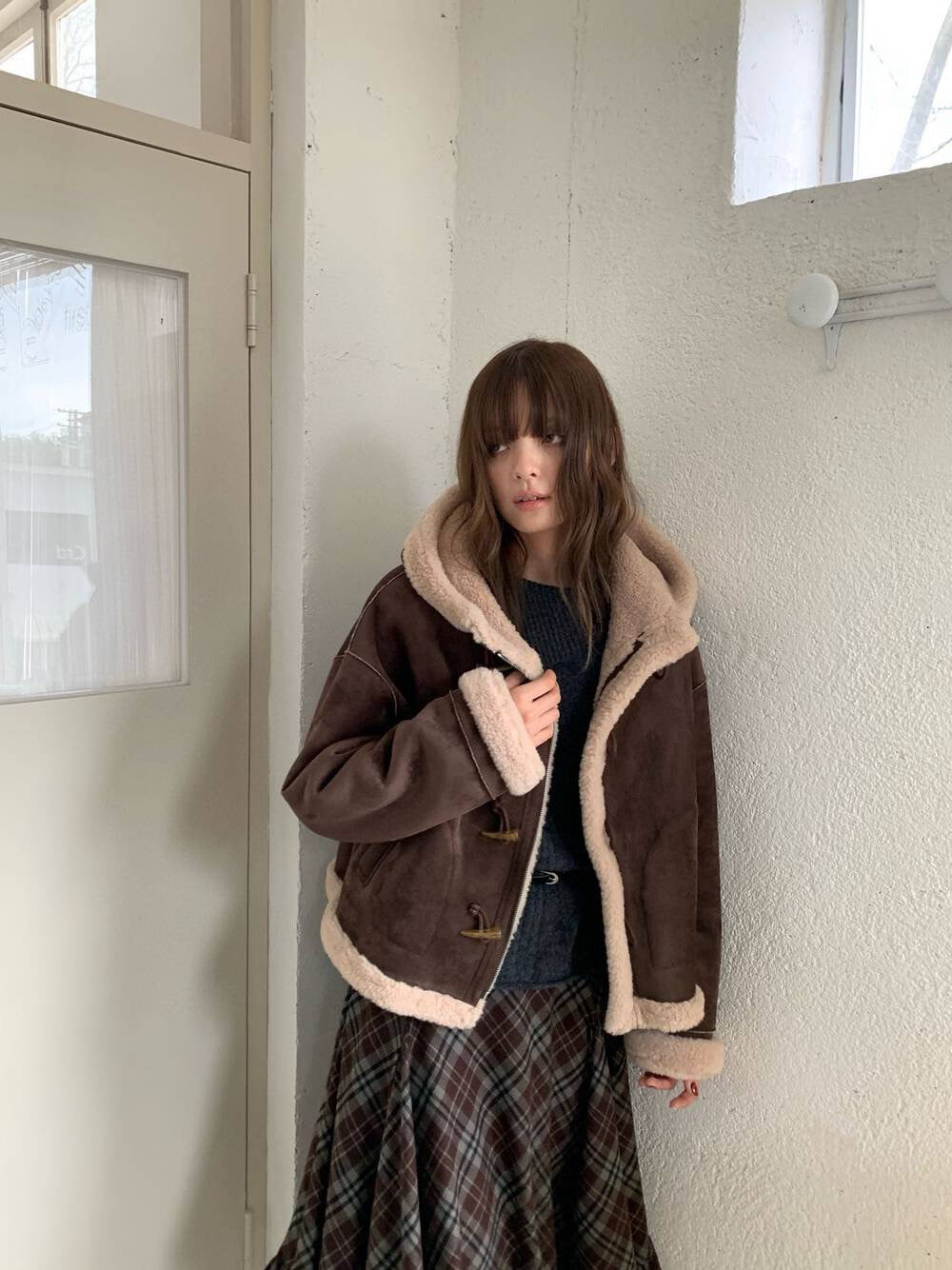 // 復古感皮毛一體連帽牛角鈕外套