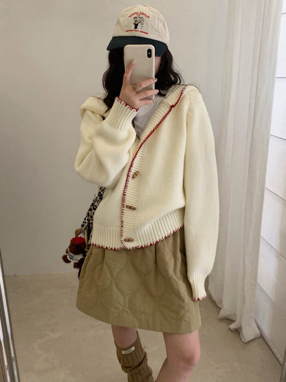 // 設計感撞色縫線包邊牛角鈕連帽CD