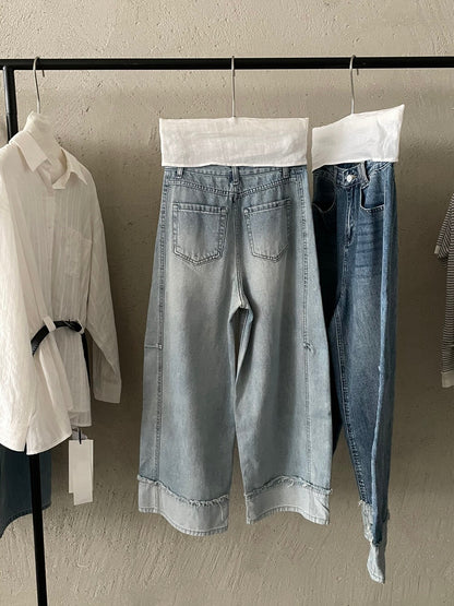 // 設計感假反褶毛邊洗水牛仔闊褲