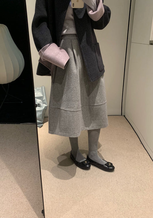 // 巨遮肉廓型毛呢中裙