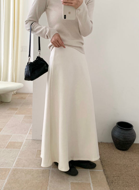 // 秒變大長腿微A字針織裙