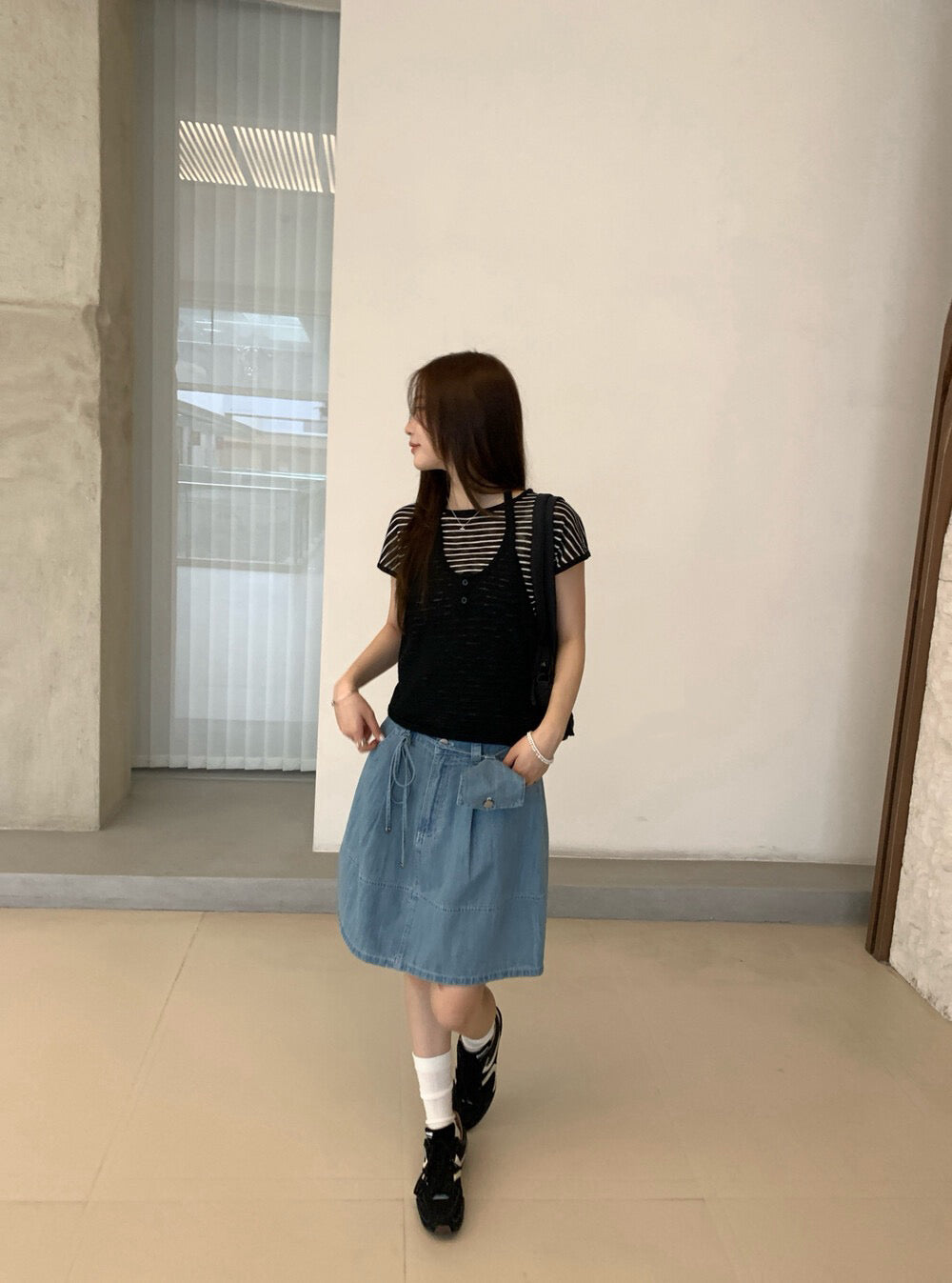 H05 / 復古感連小腰包A字牛仔短裙