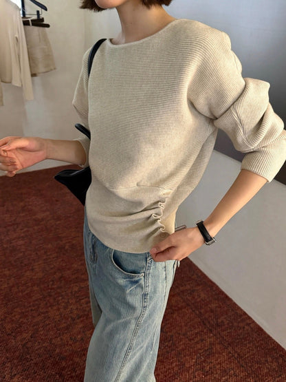 B303 / 下擺鈕扣修腰設計蝙蝠袖針織上衣